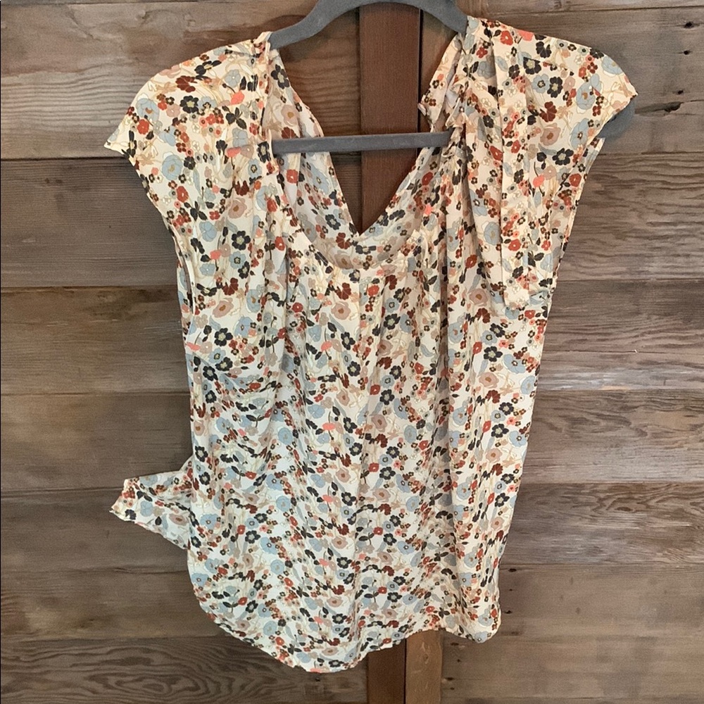 Cream Flutter Sleeve Ruffled Blouse